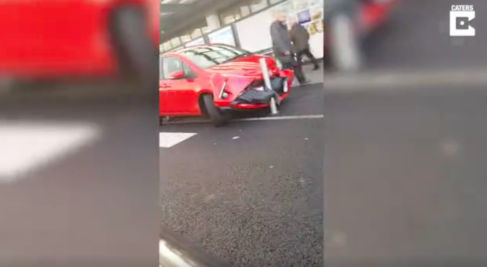 A man and his son filmed the parking fail in the Aldi carpark. Source: Caters News