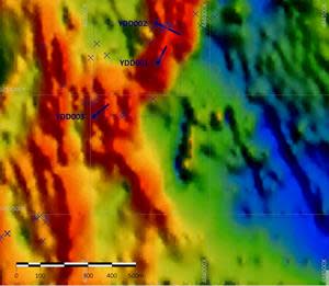 Drillhole location and downhole trace on chargeability image from IP survey (red indicates high chargeability blue indicates low chargeability)