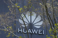 The Huawei brand logo is seen on a building in the sprawling Huawei headquarters campus in Shenzhen, China, Saturday, Sept. 25, 2021. Two Canadians detained in China on spying charges were released from prison and flown out of the country on Friday, Prime Minister Justin Trudeau said, just after a top executive of Chinese communications giant Huawei Technologies reached a deal with the U.S. Justice Department over fraud charges and flew to China. (AP Photo/Ng Han Guan)
