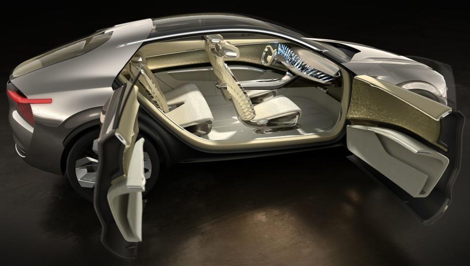 <p>The rest of the Imagine's interior is typical concept-car extravagance, too. The four seats are covered in leather and silk and have shells with a diamond-cut finish, and the door cards are covered in leather and a metallic fabric.</p>