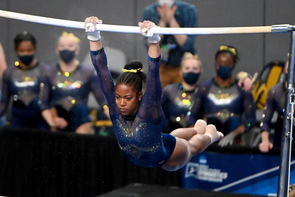 Michigan's Sierra Brooks performs on the uneven bars during the NCAA championships in Fort Worth, Texas, on Saturday, April 17, 2021.