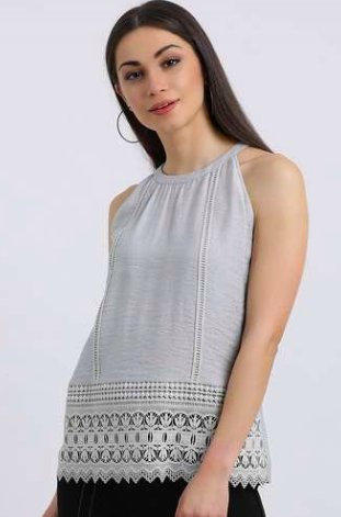 <a href="https://fave.co/2QqgmD1" rel="noopener" target="_blank" data-ylk="slk:BUY HERE;elm:context_link;itc:0;sec:content-canvas" class="link ">BUY HERE</a> Sleeveless grey cotton and lace top, by Zink London from Shoppers Stop, for Rs. 1,399