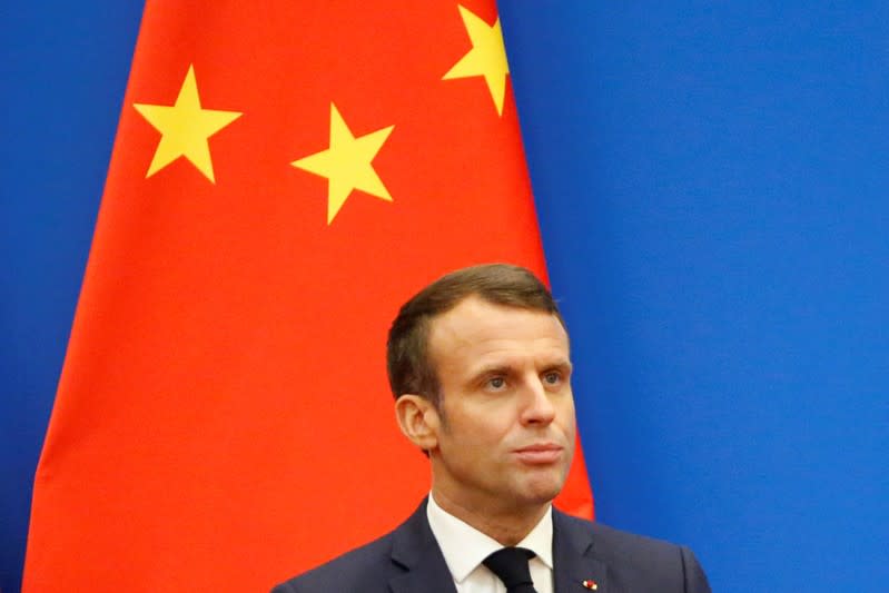 French President Emmanuel Macron speaks at a China-France Economic Forum at the Great Hall of the People in Beijing