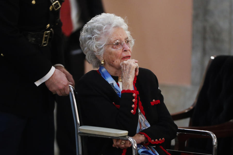 FILE - In this Dec. 16, 2016 file photo, Annie Glenn arrives to view the casket of her husband famed astronaut John Glenn as he lies in honor, in Columbus, Ohio. Glenn, the widow of astronaut and U.S. Sen. John Glenn and a communication disorders advocate, died Tuesday, May 19, 2020, of COVID-19 complications at a nursing home near St. Paul, Minn., at age 100. (AP Photo/John Minchillo, File)