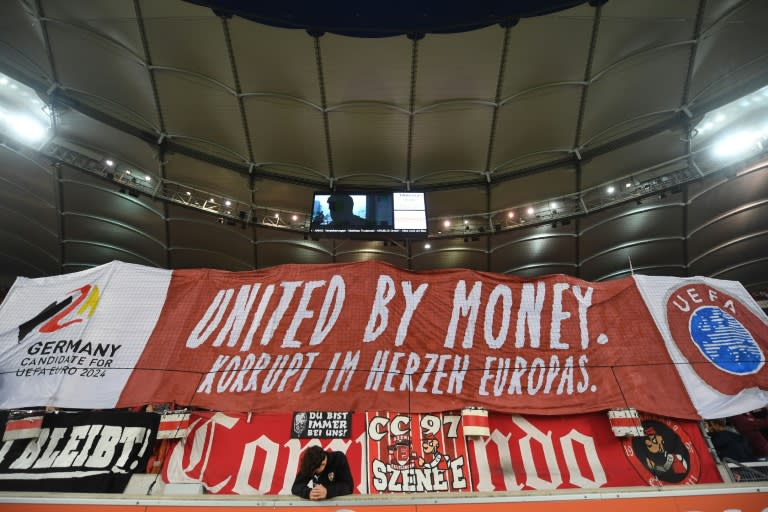 Fans in Stuttgart protested on Friday against the Germany bid to host Euro 2024, with the decision to be made on Thursday, with a giant banner stating "united by money, corrupt in the heart of Europe"