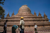 <p>Workers set the security line around the earthquake-damaged Sitanagyi Pagoda in Bagan, Myanmar, Thursday, Aug. 25, 2016. (AP Photo/Hkun Lat) </p>