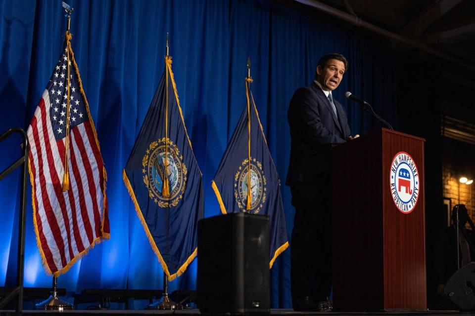 Florida Gov. Ron DeSantis delivers remarks during the New Hampshire GOP's Amos Tuck Dinner on April 14, 2023 in Manchester, New Hampshire.  During his first trip to the state, DeSantis spoke before over 500 attendees at the annual Amos Tuck fundraising dinner for the New Hampshire Republican Party.