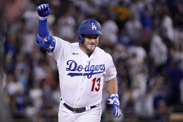 Betts and Muncy, both new dads, power Dodgers past Cards 7-3