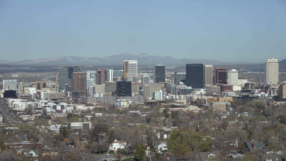 Downtown Salt Lake City is shown Wednesday, April 10, 2024. Salt Lake City's enduring enthusiasm for hosting the Olympics was on display, when members of the International Olympic Committee came to Utah during a site visit ahead of a formal announcement expected this July to name Salt Lake City the host for the 2034 Winter Olympics. (AP Photo/Rick Bowmer)