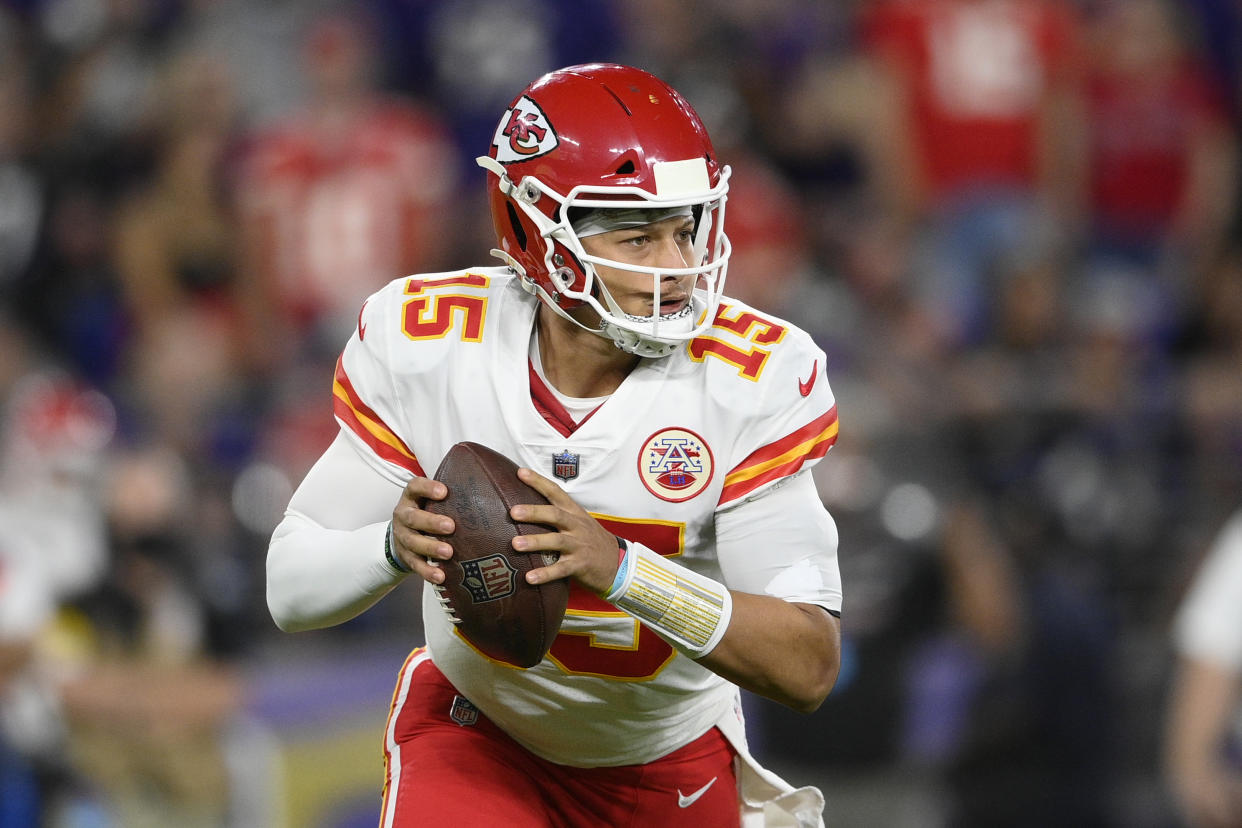 Kansas City Chiefs quarterback Patrick Mahomes looks for a receiver in the first half of an NFL football game against the Baltimore Ravens, Sunday, Sept. 19, 2021, in Baltimore. (AP Photo/Nick Wass)