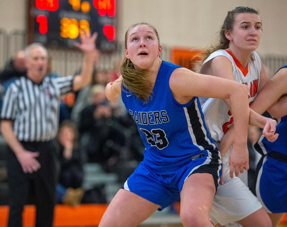 Dover-Sherborn senior captain Erica Hills looks for a rebound at Wayland, Feb. 6, 2023.