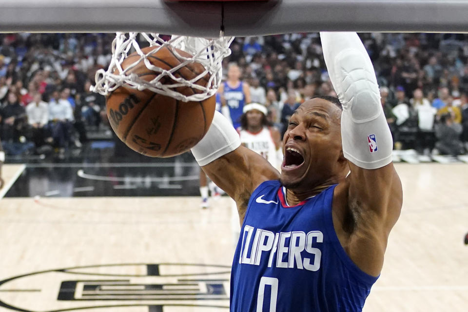 Los Angeles Clippers guard Russell Westbrook dunks during the first half of an NBA basketball game against the Portland Trail Blazers Wednesday, Oct. 25, 2023, in Los Angeles. (AP Photo/Mark J. Terrill)
