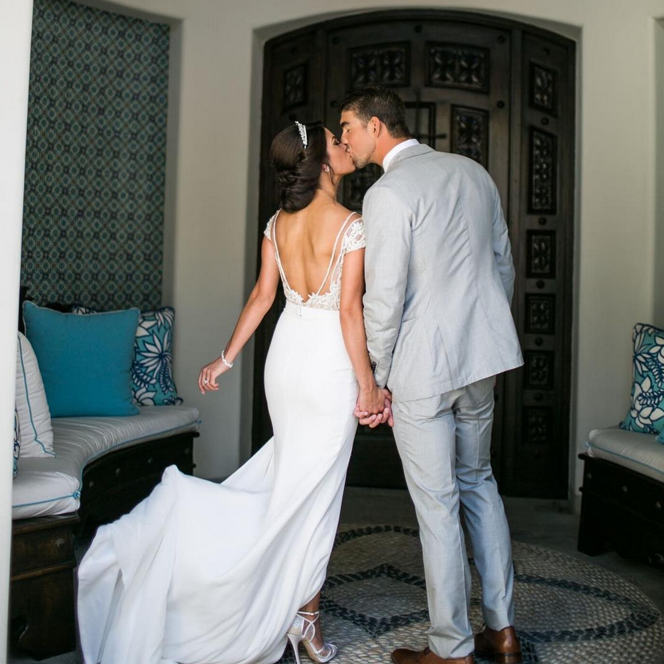 <p>“One year ago I had the privilege of marrying my best friend!” the Olympian wrote, sharing this kissy pic with his wife, Nicole. “Love you forever and ever @mrs.nicolephelps” (Photo: <a rel="nofollow noopener" href="https://www.instagram.com/p/Ba1oh2_HUMQ/?taken-by=m_phelps00" target="_blank" data-ylk="slk:Michael Phelps via Instagram;elm:context_link;itc:0;sec:content-canvas" class="link ">Michael Phelps via Instagram</a>) </p>