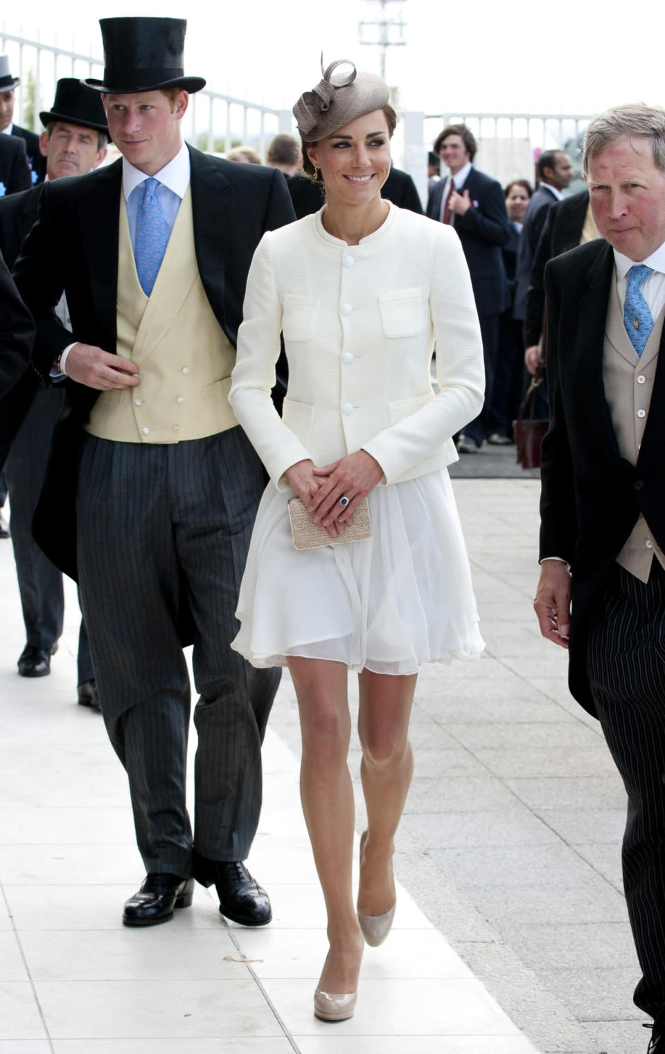 <p>Kate chose a white Reiss look for the Epsom Derby and a white tweed jacket by Joseph. She accessorised with nude heels and clutch by L.K. Bennett.</p><p><i>[Photo: PA]</i></p>