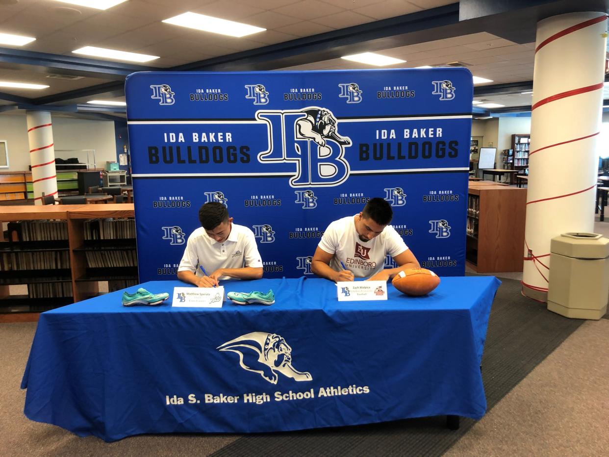 Ida Baker held a signing ceremony for two athletes on Wednesday. Zach Malpica signed with Edinboro University Football and Matthew Speruta signed with FGCU cross country.