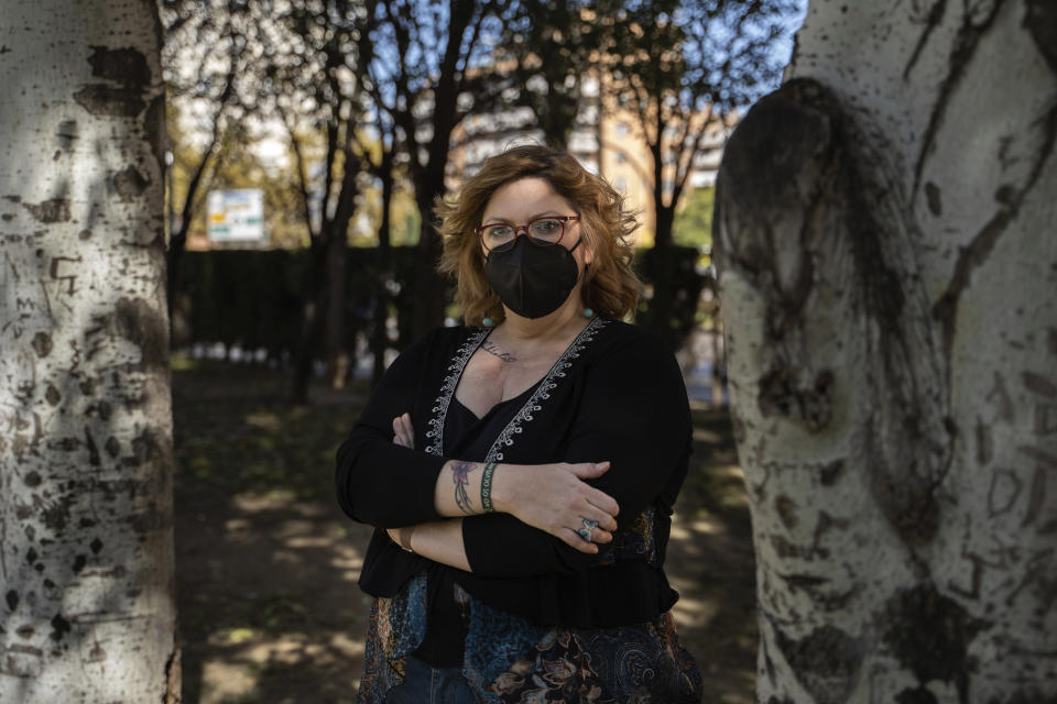 Lucía Ruiz, who survived an attack by the Basque separatist militant group ETA in 1987 when she was 10 years old, poses for a photo near the site of the blast that targeted the military police barracks where she lived with her father, a civil guard, in Zaragoza, Spain, Friday, Oct. 16, 2020. Josu Urrutikoetxea, the last known chief of ETA, the now-extinct Basque separatist militant group, goes on trial Monday Oct. 19, 2020 in Paris for terrorism charges that he deems “absurd” because of his role in ending a conflict that claimed hundreds of lives and terrorized Spain for half a century. (AP Photo/Renata Brito)