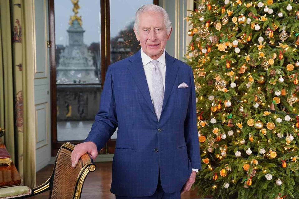 <p>Jonathan Brady - WPA Pool /Getty</p> King Charles poses with replantable tree for recording of annual Christmas message