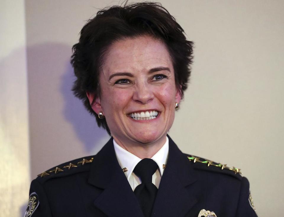 FILE - In this Jan. 10, 2017 file photo, Atlanta Chief of Police Erika Shields smiles during her oath of office ceremony at the Commerce Club in Atlanta. Shields is among the growing number of women heading departments, many in need of image makeovers. (Curtis Compton/Atlanta Journal-Constitution via AP, File)