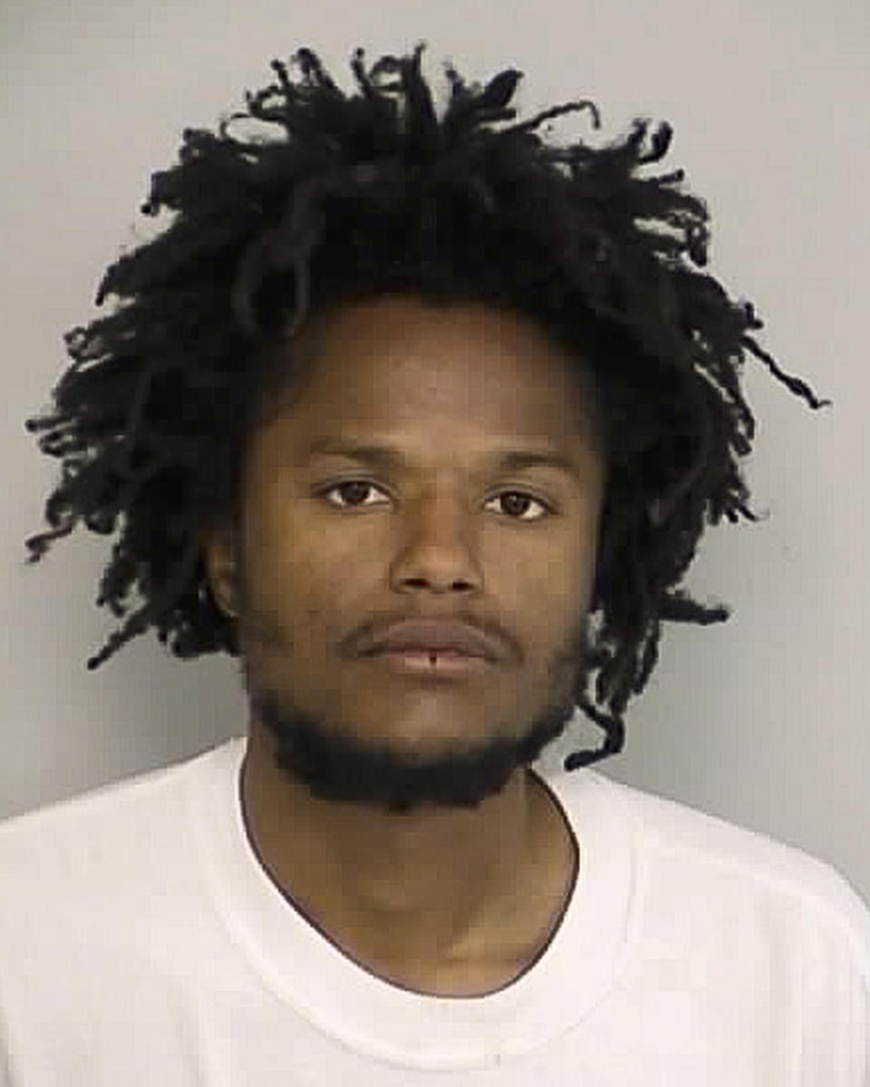 This booking photo released on Tuesday, April 1, 2014, by the North Las Vegas Police Department, shows suspect Darius Davon Sorrells, who has been in custody since a high-speed weekend traffic chase in North Las Vegas. Authorities said his 53-year-old mother and 33-year-old sister have been missing since last week. Police investigating a bloody double-slaying that left body parts inside a North Las Vegas home named a 30-year-old man as the suspect on Tuesday. (AP Photo/North Las Vegas Police Department)