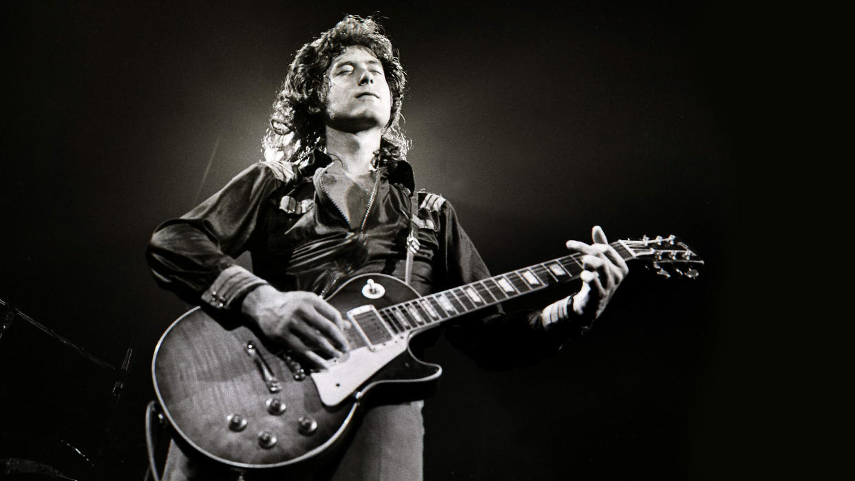  UNITED STATES - JUNE 01: Photo of LED ZEPPELIN; Jimmy Page performing live onstage, playing Gibson Les Paul guitar. 