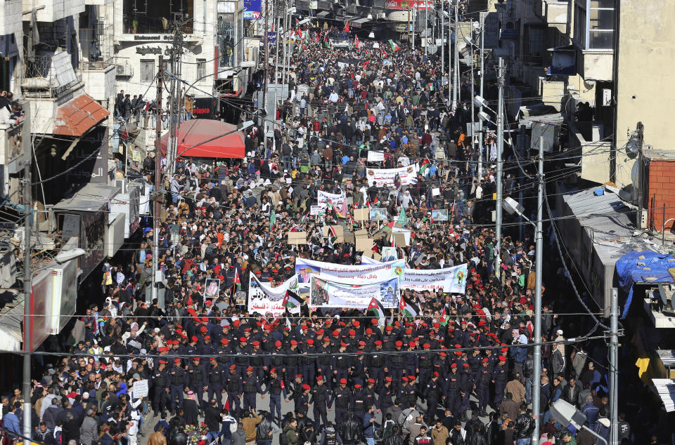 <p>Jordanian protesters shout slogans during a protest in Amman, Jordan after Donald Trump’s decision to recognize Jerusalem as the capital of Israel, on Friday, Dec. 8, 2017. (Photo: Raad Adayleh/AP) </p>