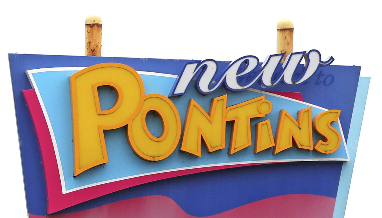 A sign for a Pontins holiday park. (Peter Byrne/PA via AP, File)