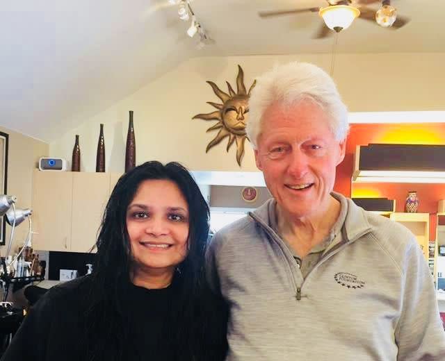 Lohud's Swapna Venugopal Ramaswamy with Bill Clinton, who unexpectedly stopped by at a Chappaqua beauty parlor.