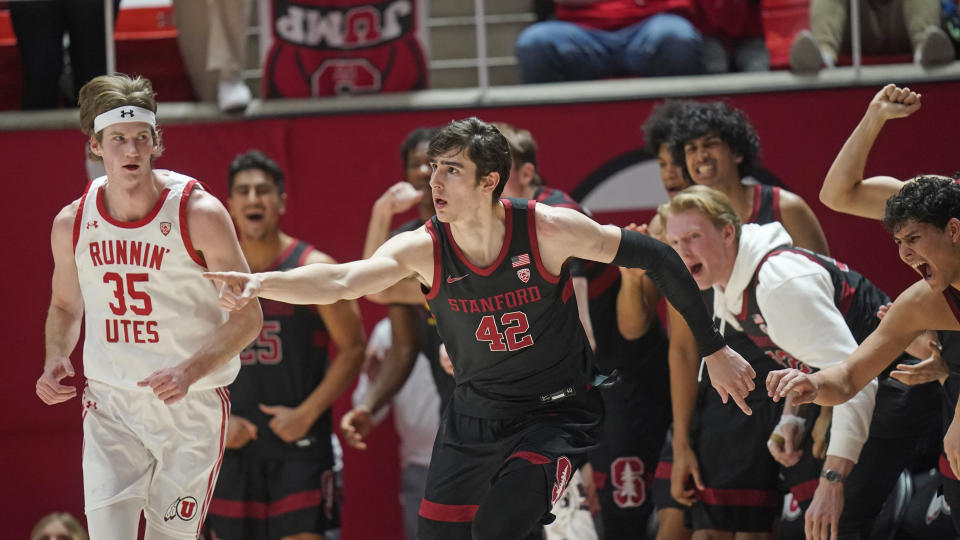 Stanford forward Maxime Raynaud (42) reacts after making a 3-point basket against Utah during the second half of an NCAA college basketball game Thursday, Feb. 2, 2023, in Salt Lake City. (AP Photo/Rick Bowmer)