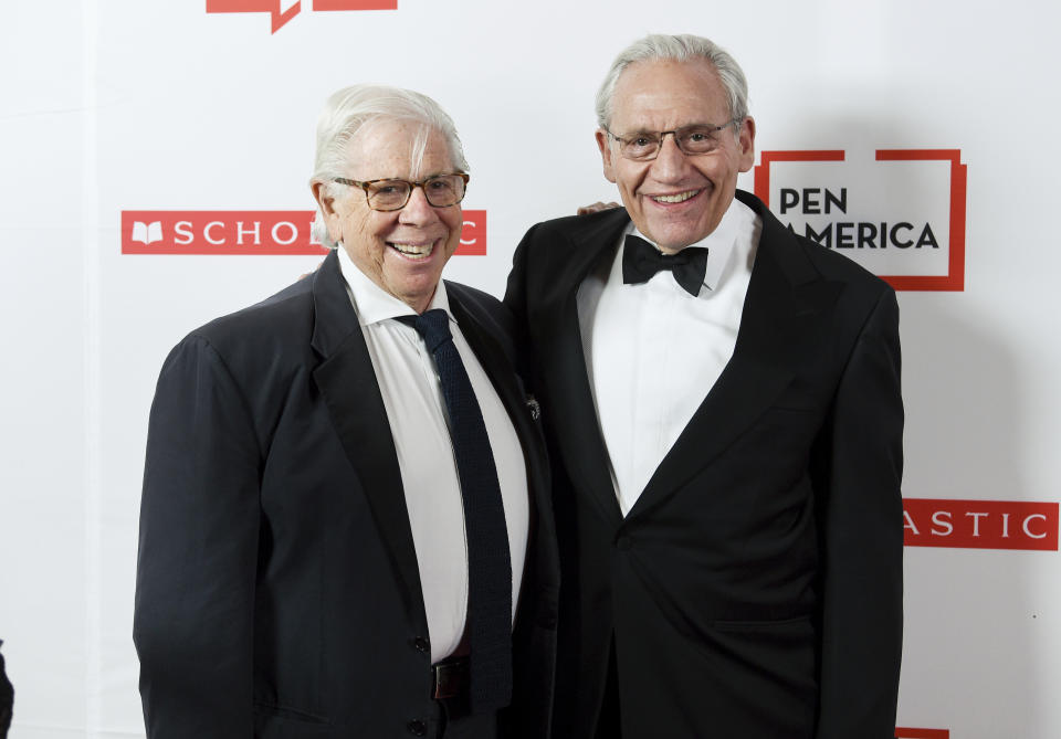 PEN literary service award recipient Bob Woodward, right, poses with fellow journalist and author Carl Bernstein at the 2019 PEN America Literary Gala at the American Museum of Natural History on Tuesday, May 21, 2019, in New York. (Photo by Evan Agostini/Invision/AP)