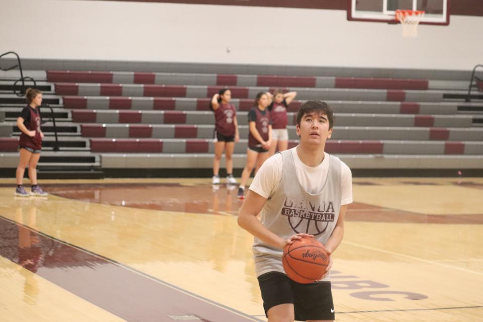 Skylar Ju shown at basketball practice.