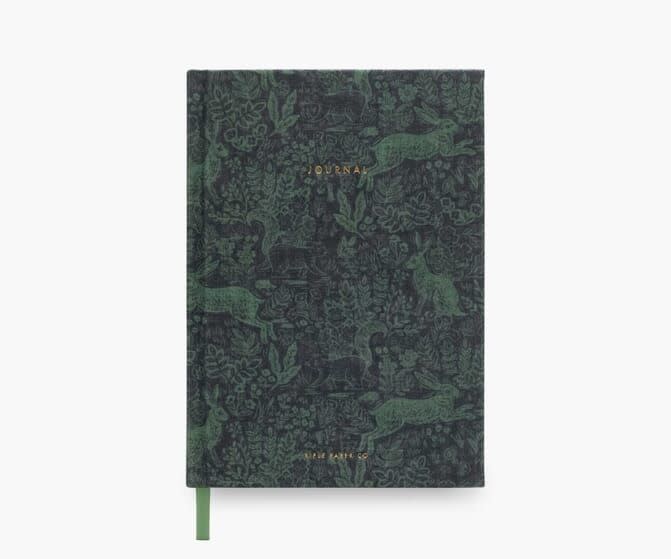 <p><strong>Rifle Paper Co.</strong></p><p>riflepaperco.com</p><p><strong>$24.00</strong></p><p>Allow your loved one to create some stories of her own with this beautiful fabric journal from Rifle Paper Co. This journal features lay-flat binding, a coordinating bookmark, and gold foil accents for a luxe writing experience.</p>