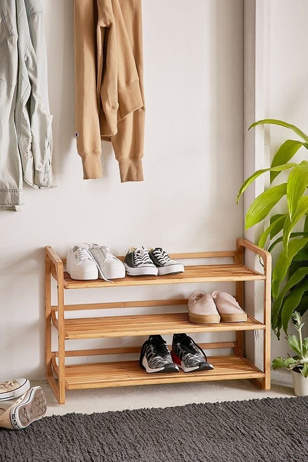 Keep your storage sleek and stylish with <a href="https://www.urbanoutfitters.com/shop/bamboo-shoe-storage?category=furniture&amp;color=111" target="_blank">these tri-tiered bamboo shelves</a> that can hold your shoes, books, candles, and more.