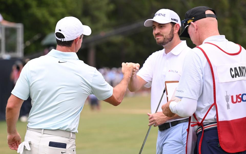 Not best of buddies Rory McIlroy and Patrick Cantlay say hello to each other