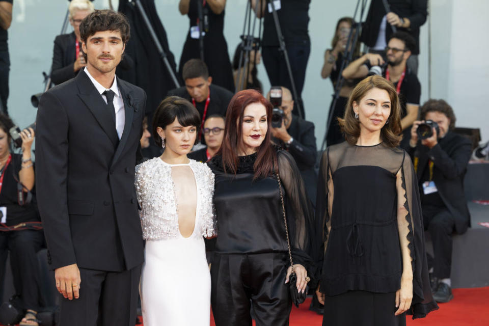 Jacob at the Priscilla premiere red carpet with Priscilla, Cailee, and Sofia