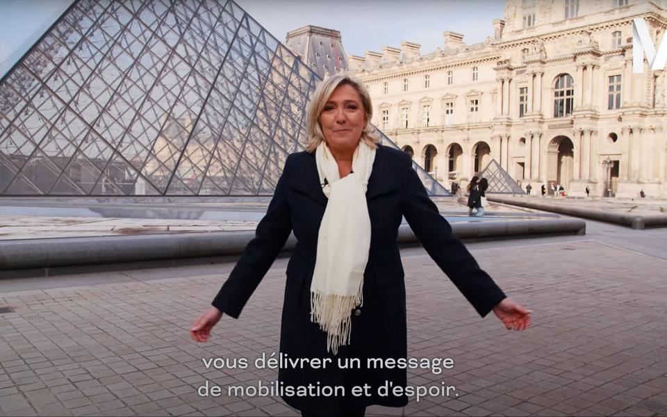 France's far-right party Rassemblement National (RN) candidate for the 2022 French presidential election Marine Le Pen delivering a speech by the Louvre Pyramid in Paris - AFP