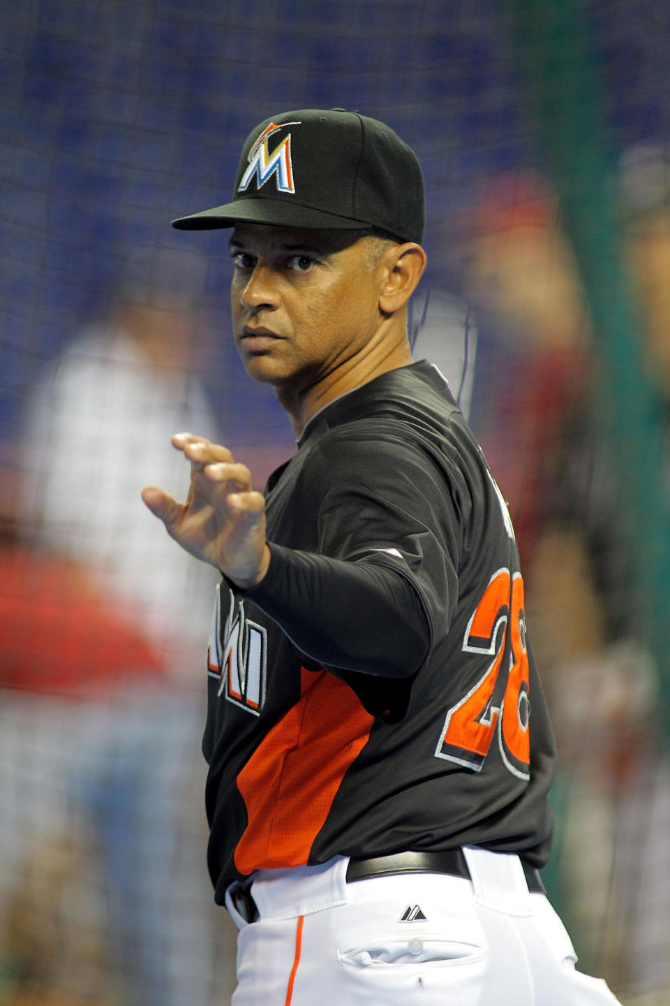 MIAMI, FL - APRIL 13: Interim Manager Joey Cora #28 conducts batting practice against the Houston Astros at Marlins Park on April 13, 2012 in Miami, Florida. (Photo by Marc Serota/Getty Images)