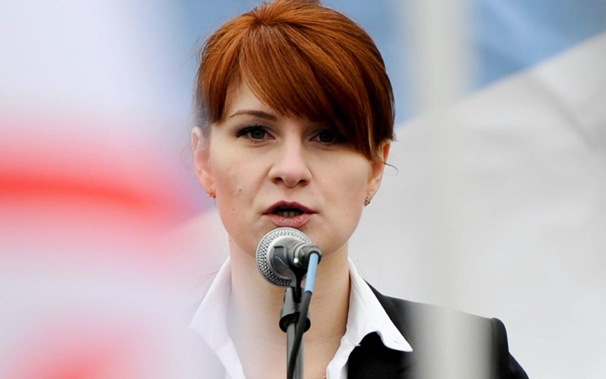 Maria Butina, leader of a pro-gun organization in Russia, speaks to a crowd during a rally in support of legalizing the possession of handguns in Moscow - AP