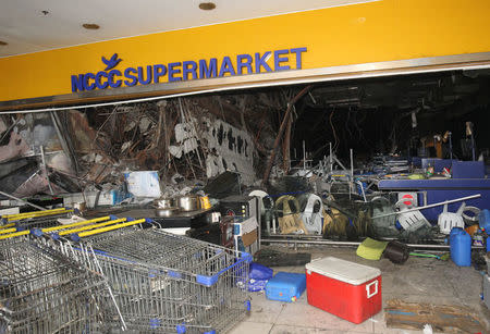 A view of a mall after it was gutted by a fire in Davao city, Philippines, December 29, 2017. REUTERS/Lean Daval Jr