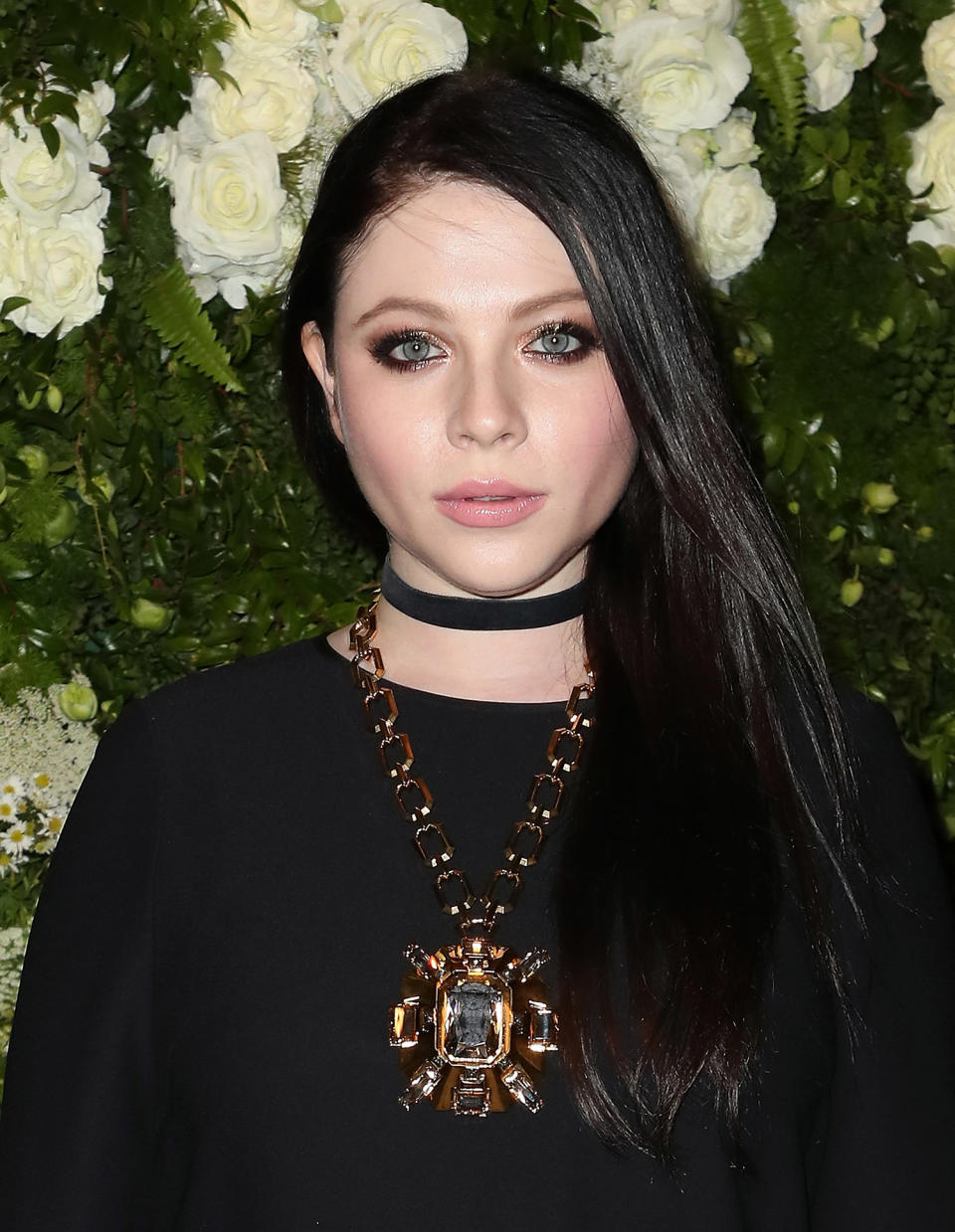 <p>Trachtenberg is proof that vampy beauty isn’t just winged eyeliner and burgundy-stained lips. Here she adds her own spin with long and glossy locks, an eye-brightening bronze shadow, loads of mascara, and peachy-pink lips. (Photo: Getty Images) </p>