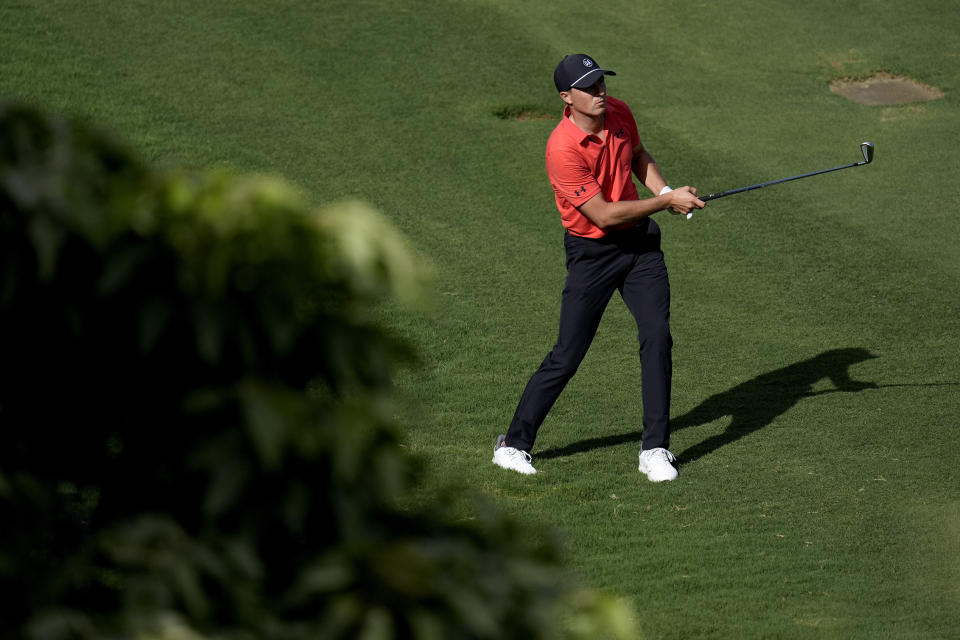 Jordan Spieth hits from the 15th fairway during the first round of The Sentry golf event, Thursday, Jan. 4, 2024, at Kapalua Plantation Course in Kapalua, Hawaii. (AP Photo/Matt York)