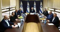 Party leaders of the proposed new coalition government, pose for a picture at the Knesset, Israel's parliament, before the start of a special session to approve and swear-in the coalition government, in Jerusalem