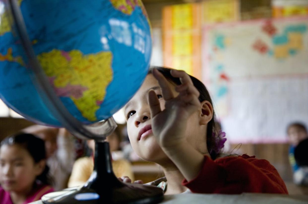 The planet and the way we live on it are constantly changing. <a href="https://www.gettyimages.com/detail/photo/china-guangxi-province-girl-looking-at-globe-in-royalty-free-image/200512222-001" rel="nofollow noopener" target="_blank" data-ylk="slk:Buena Vista Images via Getty Images;elm:context_link;itc:0;sec:content-canvas" class="link ">Buena Vista Images via Getty Images</a>