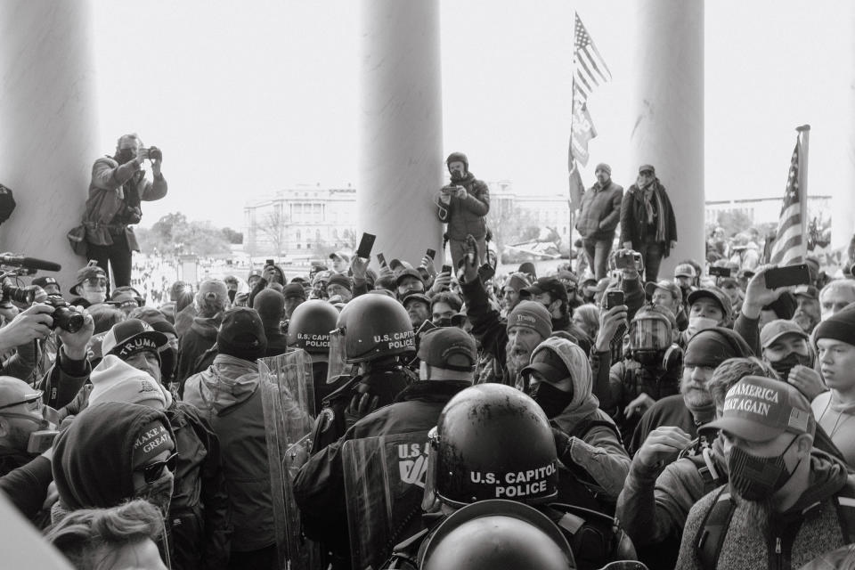 Capitol police move through the crowd of Trump supporters outside of the Capitol.<span class="copyright">Christopher Lee for TIME</span>