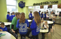 A general view of pupils during lunch hour at Hillstone Primary School, in Birmingham, England, Wednesday, Nov. 30, 2022. For some children in low-income areas in England, a school lunch may be the only nutritious hot meal they get in a day. School lunches are given for free to all younger children in England and to some of the poorest families. But the Food Foundation charity estimates that there are 800,000 children in England living in poverty who are not eligible for the free meals. (AP Photo/Rui Vieira)