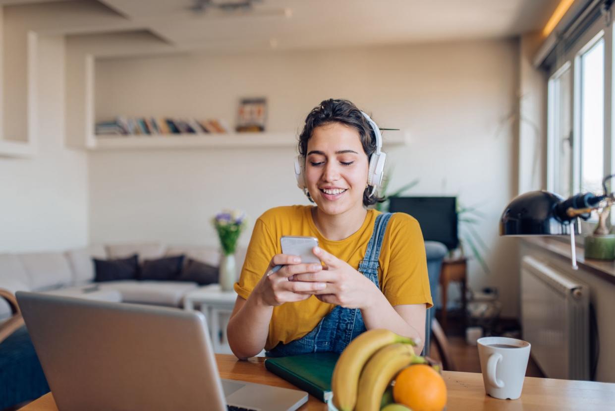 Young woman working from her home office.