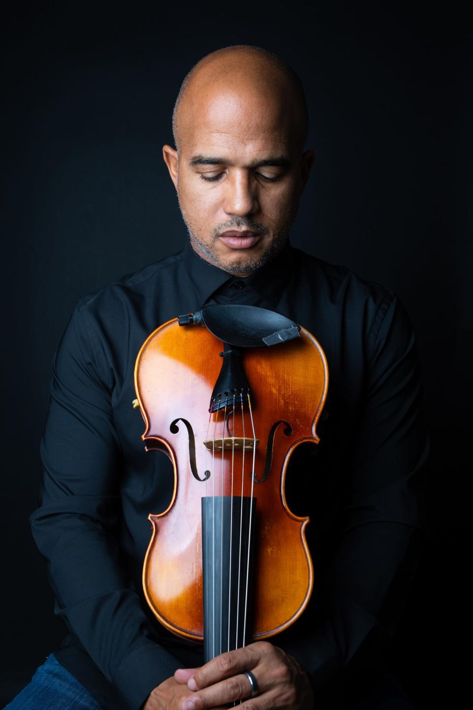 Haitian American composer, violinist and activist Daniel Bernard Roumain, the creative force behind the exhibit "The Seeing" and the companion performance "The Telling."