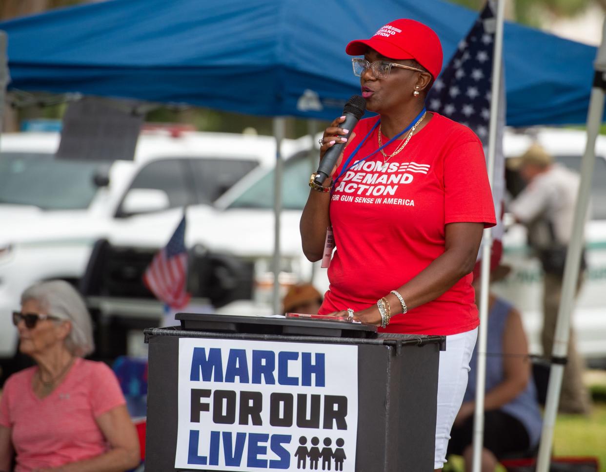 Crystal Turner, of Jacksonville, speaks at the March for Our Lives rally on Saturday on the lawn of Castillo de San Marcos in St. Augustine. Two of Turner's children died in a shooting in April 2015.