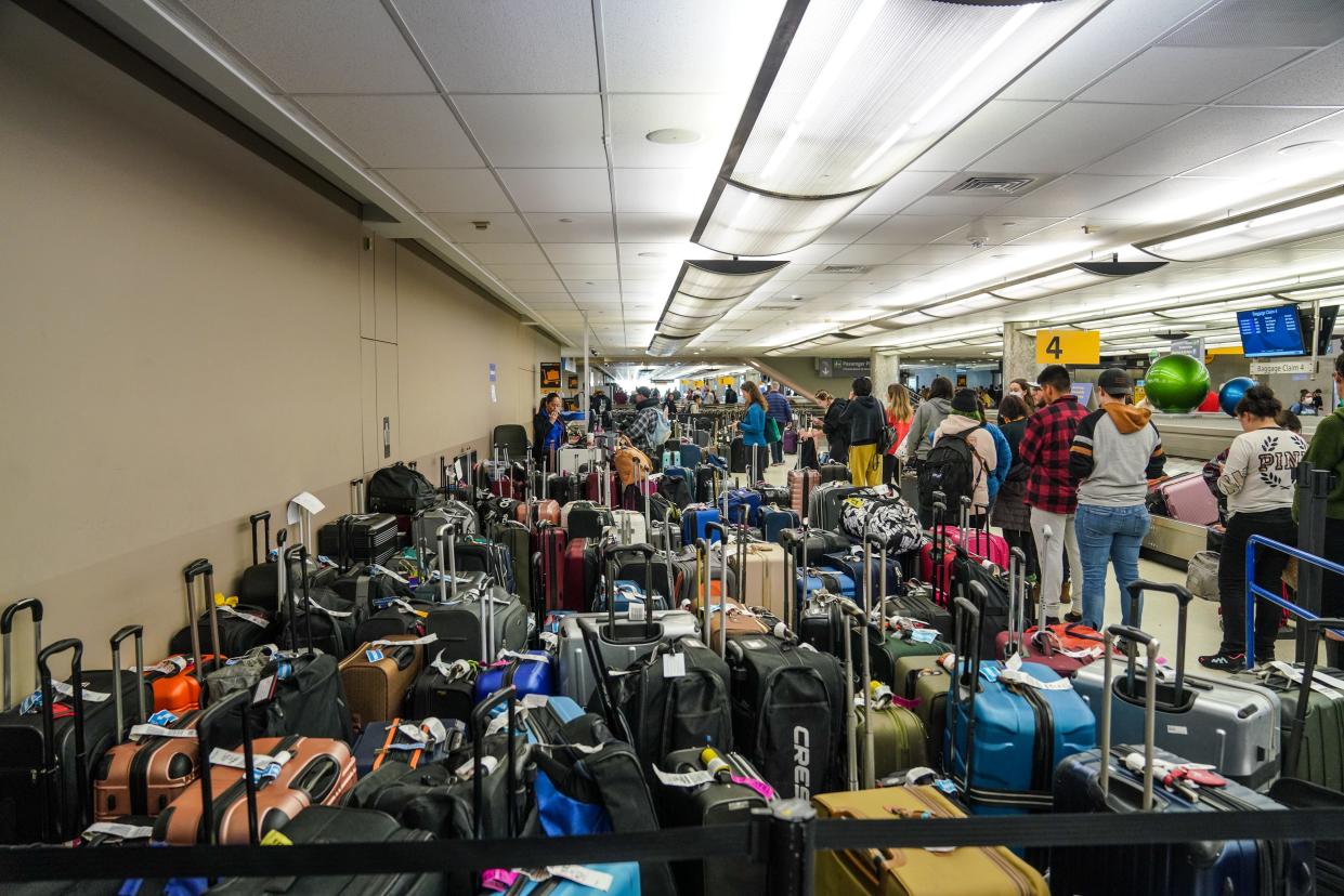 Bags at Denver International Airport awaiting reunification with their owners.