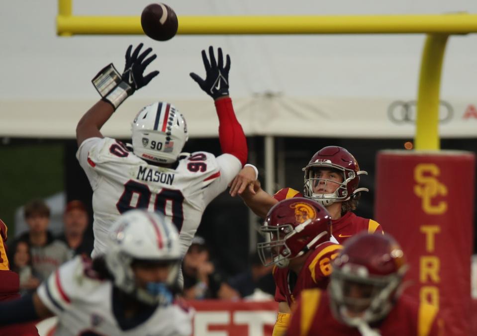 USC quarterback Jaxson Dart throws downfield against Arizona.