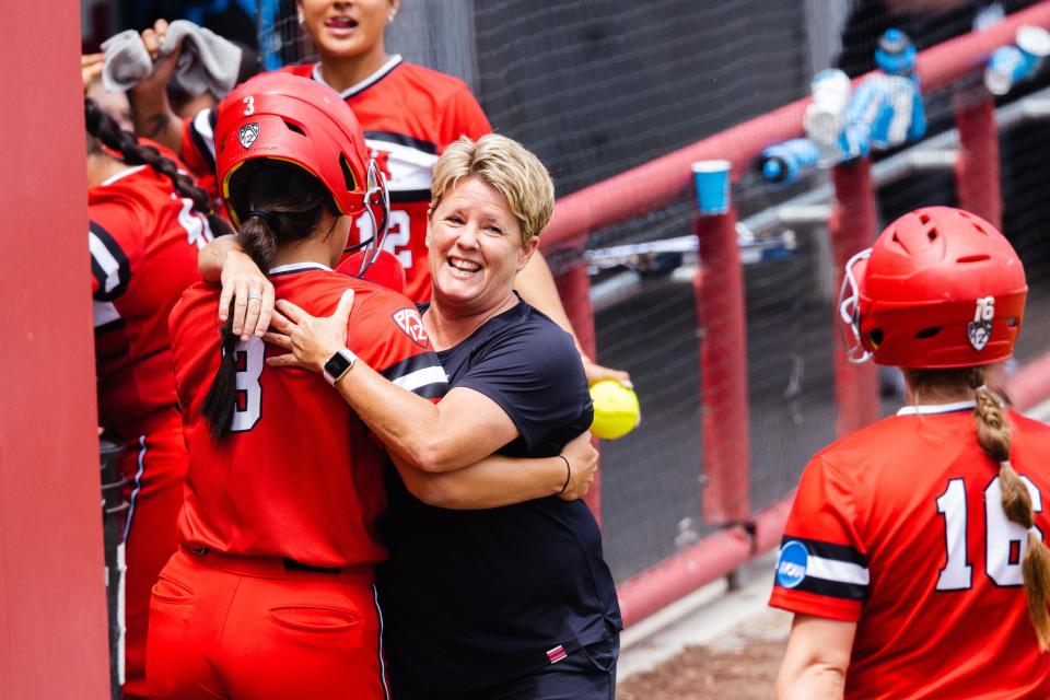 Utah head coach Amy Hogue celebrates after a run during the third game of the NCAA softball Super Regional between Utah and San Diego State at Dumke Family Softball Stadium in Salt Lake City on Sunday, May 28, 2023. | Ryan Sun, Deseret News